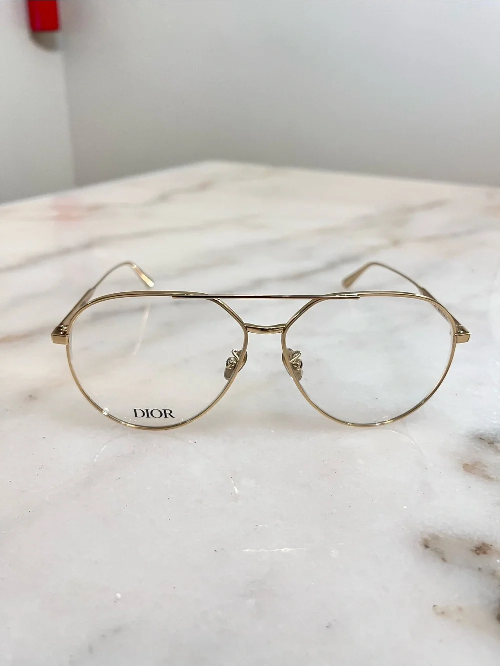 Eyeglasses on Marble Surface